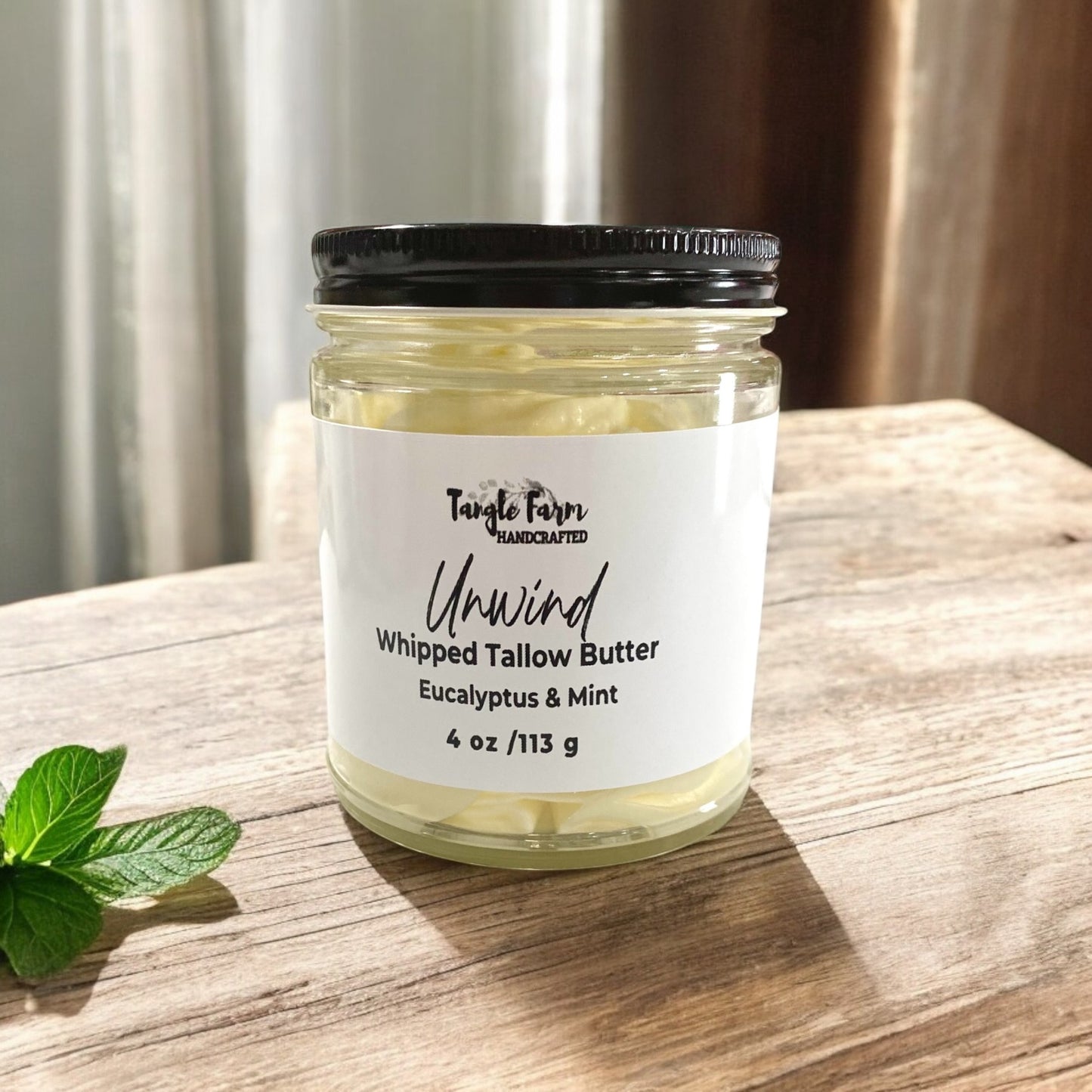 Whipped Tallow Butter in 4 oz Unwind scented with eucalyptus and mint