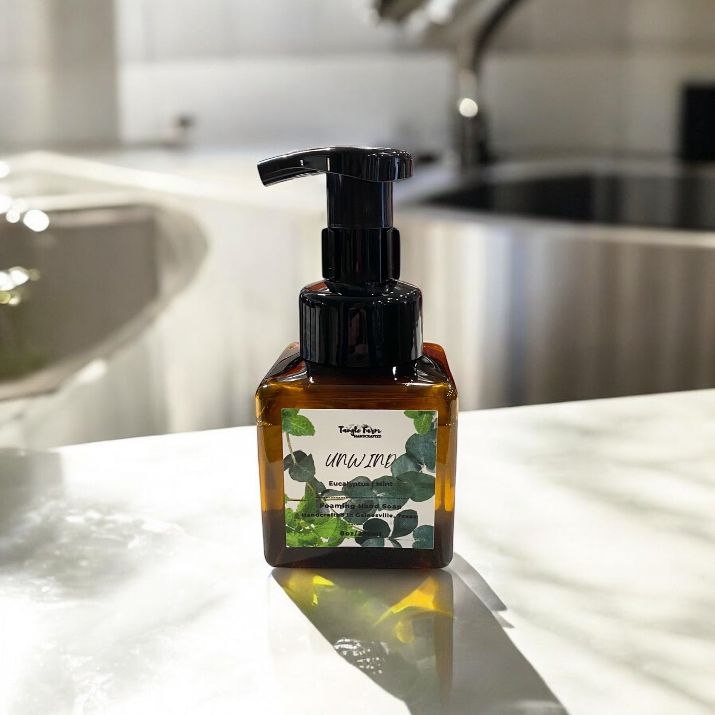 Unwind 8oz foaming hand soap scented with Eucalyptus and Mint
