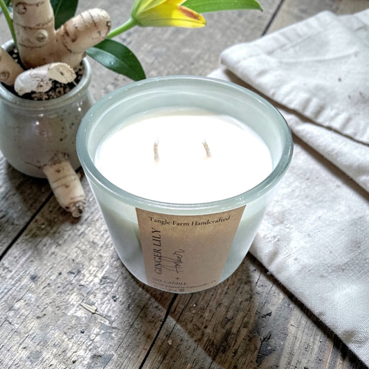 Ginger lily and amber soy candle in a colorful Serafina container, 10oz.