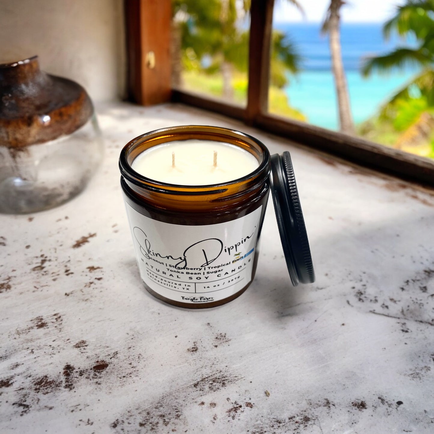 Skinny Dippin' soy candle, a butt naked scent candle with coconut, tropical fruits and sugar.