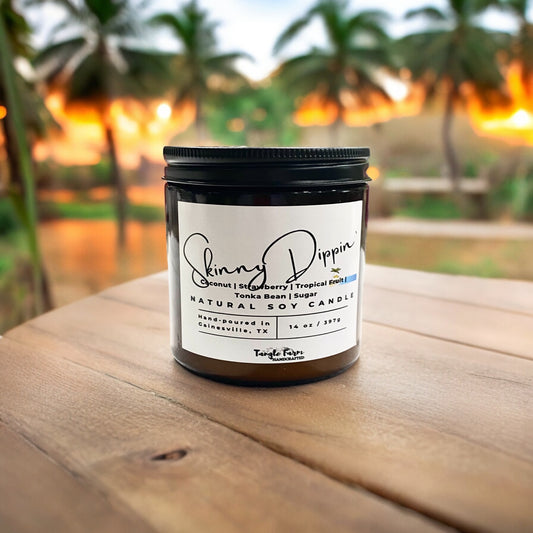 Skinny Dippin' soy candle, a butt naked scent candle with coconut, tropical fruits and sugar.