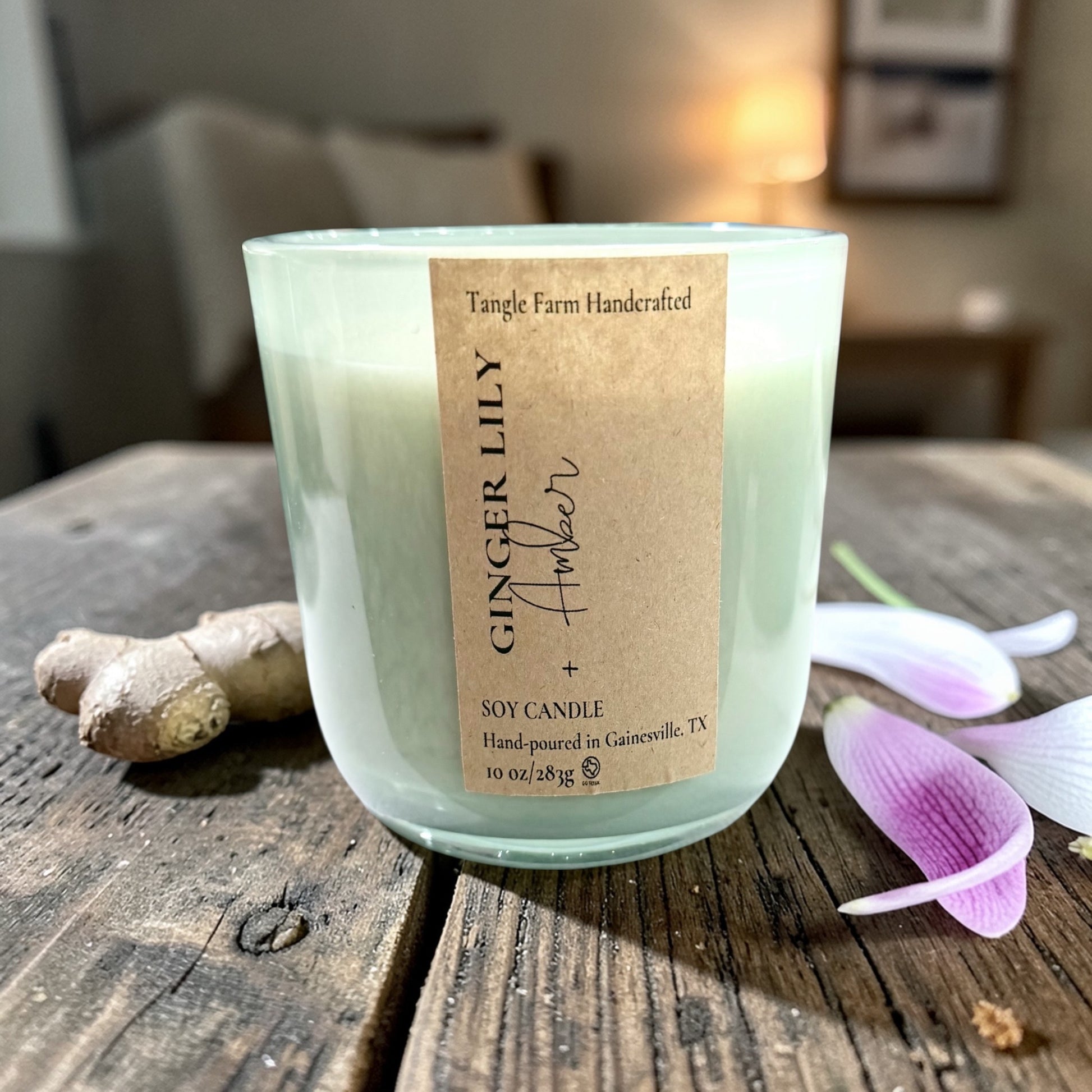 Ginger lily and amber soy candle in a colorful Serafina container, 10oz.