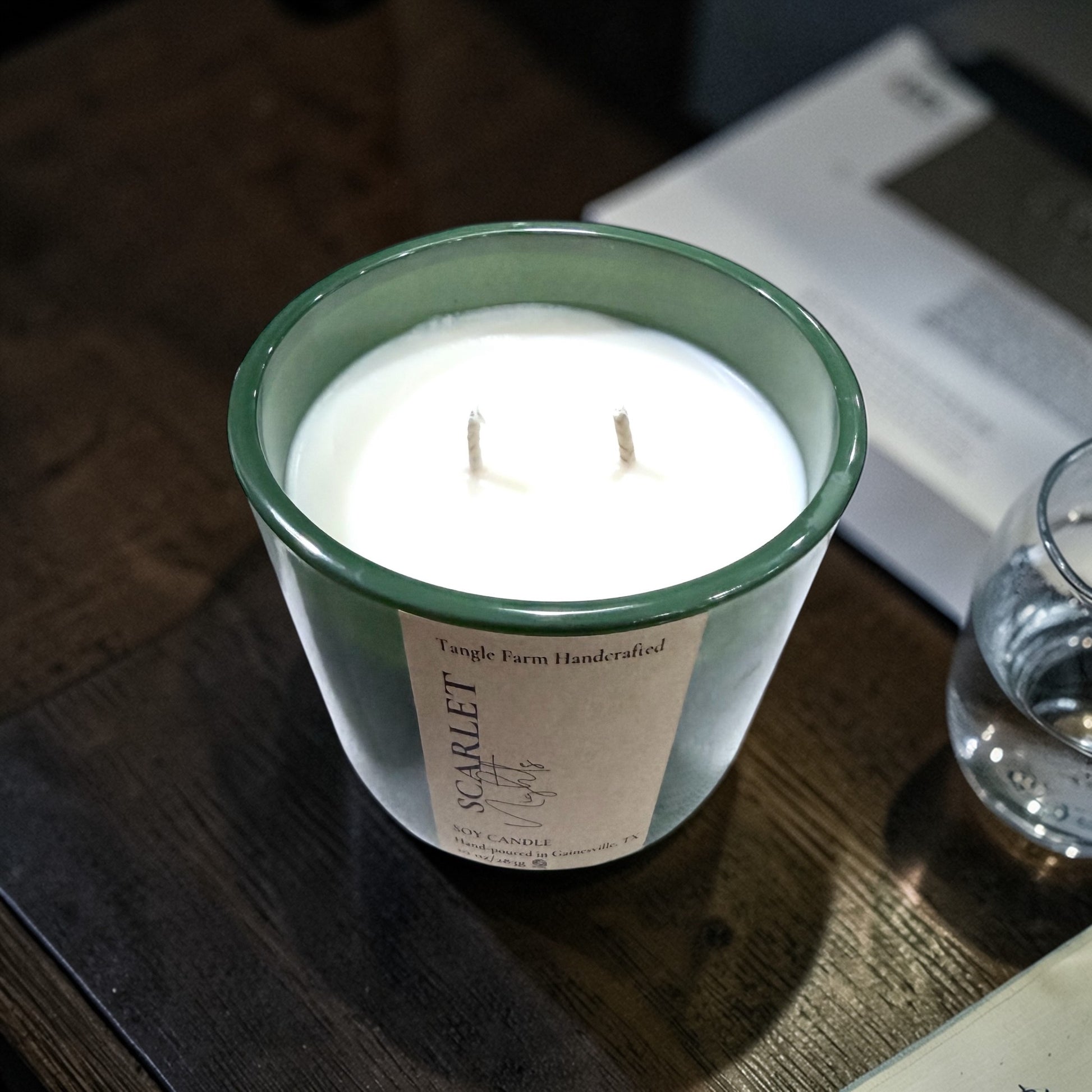 Scarlet Night soy candle in a colorful Serafina container with a wooden lid, 10oz.