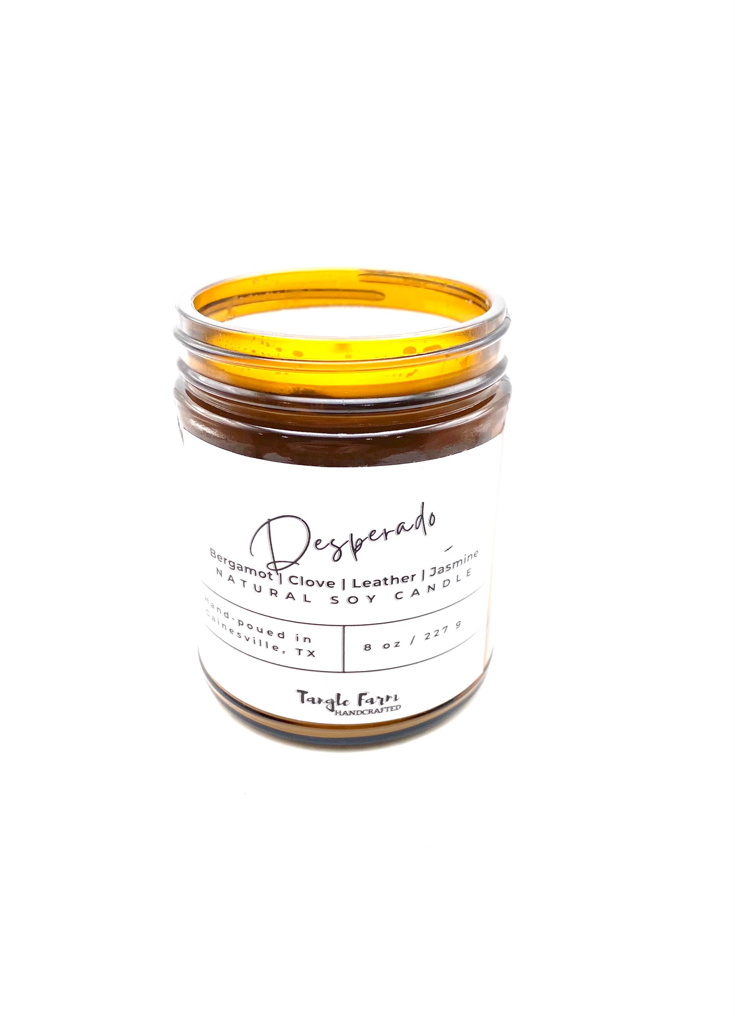 Desperado soy candle leather fruity floral clove 